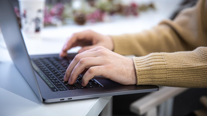 closeup-male-hands-are-working-laptop.jpg